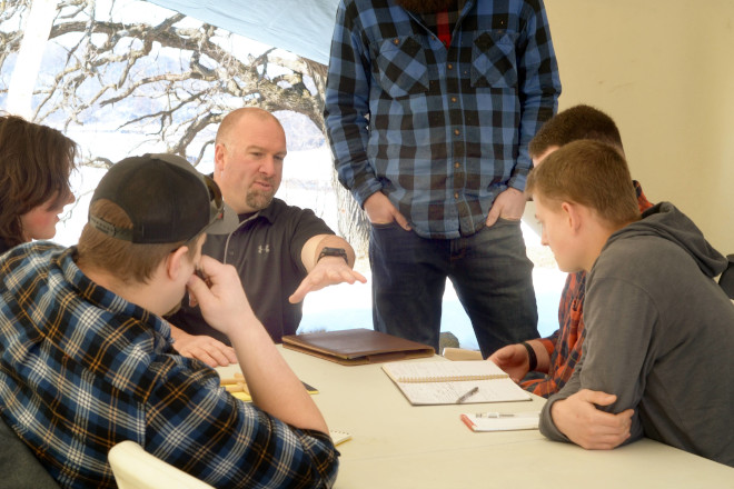 Brad Schumacher giving a tabletop discussion to BaseCampers