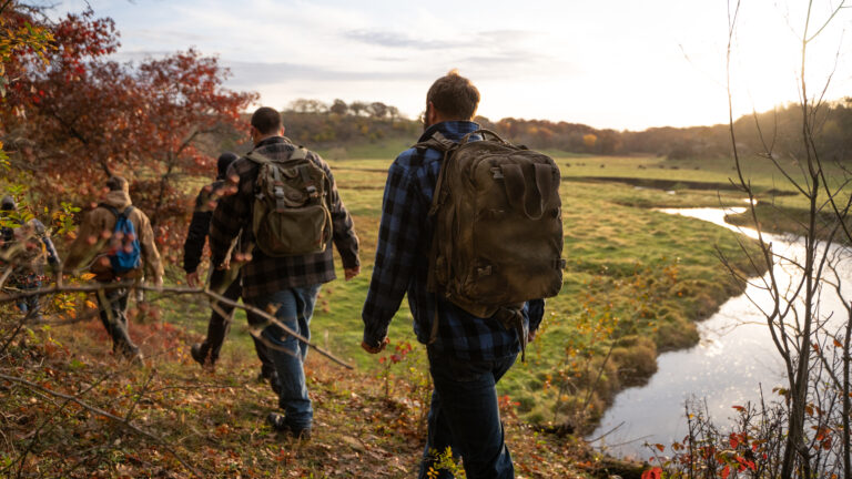 Men backpacking.